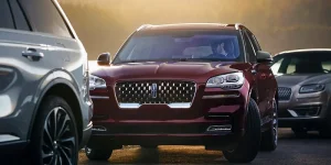Maroon 2022 Lincoln Aviator in Traffic