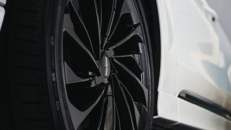 An up-close shot of a Lincoln wheel