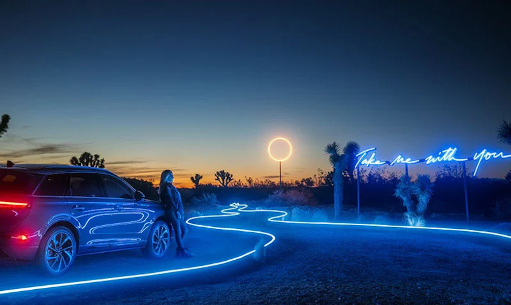 A scenic outdoor photograph highlighted with electric neon lines