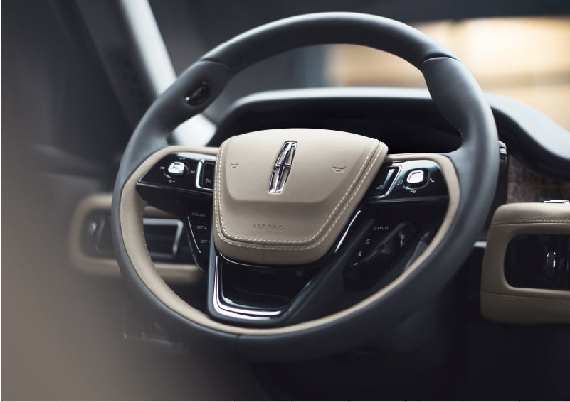 The intuitively placed controls of the steering wheel on a 2023 Lincoln Aviator® SUV | Bob Maxey Lincoln in Detroit MI