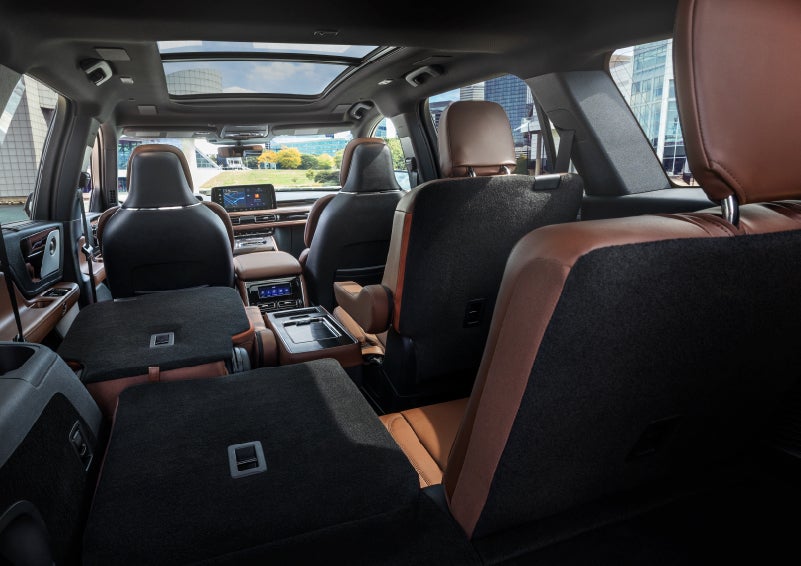 The interior of the 2025 Lincoln Aviator® SUV is shown with two seats folded down for added space. | Bob Maxey Lincoln in Detroit MI