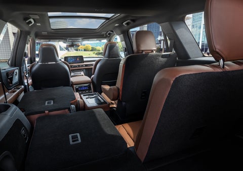 The interior of the 2025 Lincoln Aviator® SUV is shown with two seats folded down for added space. | Bob Maxey Lincoln in Detroit MI