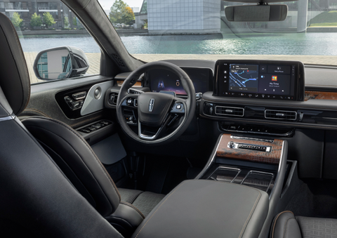 The interior of the 2025 Lincoln Aviator® SUV is shown parked with a view of a harbor through the windshield. | Bob Maxey Lincoln in Detroit MI