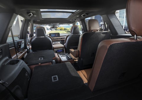 One side of the PowerFold® third-row seat and a second-row seat are folded forward in the 2026 Lincoln Aviator® SUV. | Bob Maxey Lincoln in Detroit MI
