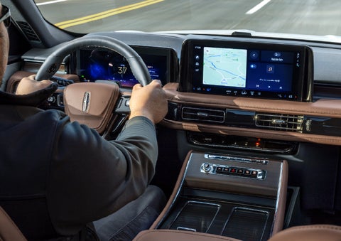 A person is driving a 2026 Lincoln Aviator® SUV as seen from inside the cabin. | Bob Maxey Lincoln in Detroit MI