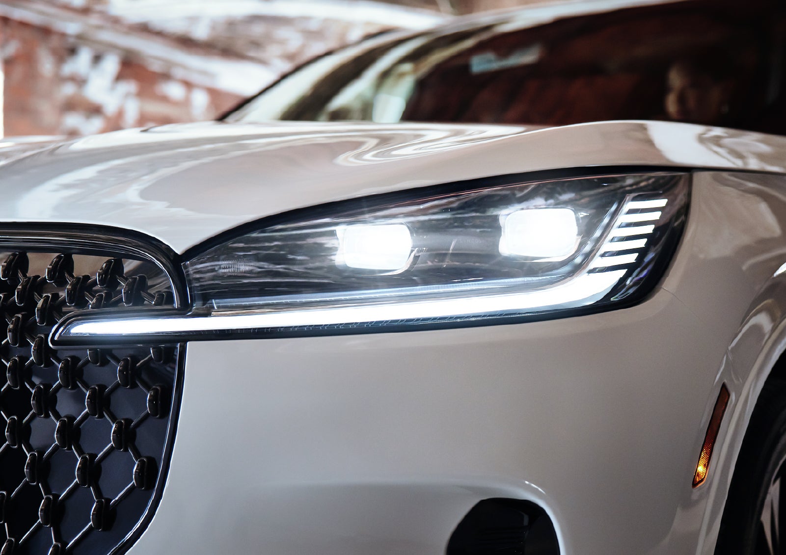 A close-up of a headlamp on the 2027 Lincoln Aviator® SUV is shown. | Bob Maxey Lincoln in Detroit MI